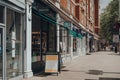 Row of shops on High Street Kensington, London, UK Royalty Free Stock Photo
