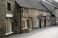 A row of shops and pubs in the town centre of Stow on the Wold in Gloucestershire in the UK