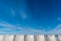 A row of silages in front of blue sky Royalty Free Stock Photo