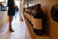 Row of simply amber glass of bottles on shelf. Royalty Free Stock Photo