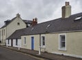 A row of single storey old Fishermens Cottages at Long Lane in Broughty Ferry, near Dundee. Royalty Free Stock Photo