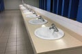 Row sinks in a public toilet Royalty Free Stock Photo