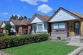 Row of small brick bungalow houses