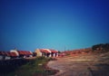 A row of small cute houses on top of the hill Royalty Free Stock Photo
