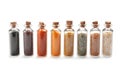 Row of small glass bottles with different spices Royalty Free Stock Photo