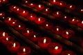 Row of small red church prayer candles Royalty Free Stock Photo