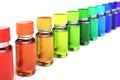 Row of sorted dropper bottles in spectrum colors Royalty Free Stock Photo