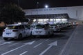 Row of Spanish cabs parked in the cab parking lot at Madrid`s south bus station