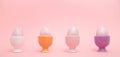 Row of speckled eggs in egg cups Royalty Free Stock Photo