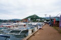 Row upon row of speed boats across the lake in the park