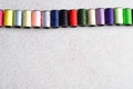 A row of spools sewing threads