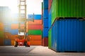 Row of Stacked Containers Cargo Shipping with Container Crane Tractor. Handling of Logistics Transportation Industry Royalty Free Stock Photo