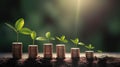 a row of stacks of coins with a plant growing out of them. Tree leaf on save money coins, Business finance saving banking investme Royalty Free Stock Photo