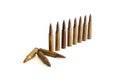 Row of standing M16 cartridges i Royalty Free Stock Photo