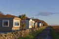 A row of static Caravans in Wairds Park facing the Beach in the Fishing Village of Johnshaven