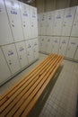 Row of steel lockers along the chair, Locker room for worker in job site, Keep personal belonging in sport complex.