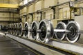 Row of steel wagon train wheels in a repair depot Royalty Free Stock Photo