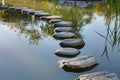 Row of Stepping Stones Over Body of Water