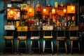 a row of stools in front of an old bar Royalty Free Stock Photo