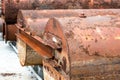 A row of stored rustic water cylinders or tanks close up shot