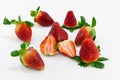 Row of Strawberry Isolated and one slice. Royalty Free Stock Photo