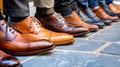 A row of stylish mens business shoes, meticulously lined up in perfect formation