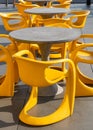 Row of tables and chairs at the open air restaurant Royalty Free Stock Photo