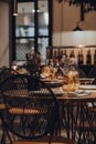 Tables set inside a restaurant, shallow focus. Royalty Free Stock Photo