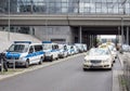 A Row of Taxis And Police Cars At Berlin Hauptbahnhof, Meaning Berlin Central Station In German Language Royalty Free Stock Photo