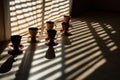 row of teacups casting shadows on a sunlit surface Royalty Free Stock Photo