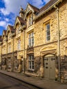 Row of terraced houses. Silver Street Cirencester United Kingdom Royalty Free Stock Photo