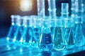 Row of test tubes filled with blue liquid. Perfect for scientific experiments and laboratory concepts Royalty Free Stock Photo