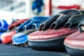 Row of thai Boxing Mitt Training Target Focus Punch Pad Glove on Royalty Free Stock Photo