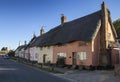 A row of thatched cottages in the village of Haughley, Suffolk