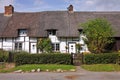 Row of Thatched English Village Cottages Royalty Free Stock Photo