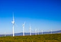 Row Of Three Bladed Energy Producing Windmills Royalty Free Stock Photo