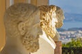 A row of three marble busts of men in the Sissi Palace near Gastouri on Corfu, Greece