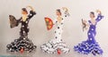 Row of three porcelain souvenir figures of Spanish flamenco dancers Royalty Free Stock Photo