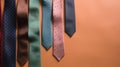 row of ties on rust orange background