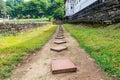 A row of tiled steps at Sri Dalada Maligawa or the Temple of the Sacred Tooth Relic, a Buddhist temple in Kandy, Sri Lanka. which Royalty Free Stock Photo