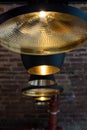 Row of Tom Dixon metallic pendant lights hanging in the Tom Dixon flagship store and showroom at Coal Drops Yard, Kings Cross. Royalty Free Stock Photo