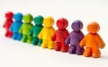 A row of toy people in different colors,DEI strategy,Diversity, Equity, and Inclusion