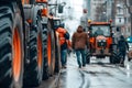 A row of tractors blocking the road due to protests Royalty Free Stock Photo