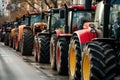 A Row of Tractors Lined Up on the Side of the Road