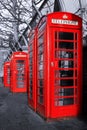 Row of traditional British red phone booths