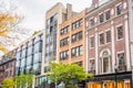 Detail of historic and modern buildings in a downtown district on a cloudy autumn day Royalty Free Stock Photo