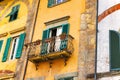 Row of traditional houses with shutters in Pisa, Italy. Landscape with Pisa old town and Arno river, Tuscany, Italy. Colorful Royalty Free Stock Photo