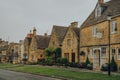 Row of traditional limestone houses in Broadway, Cotswolds, UK