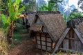 A row of traditional rice barns consisting of four buildings on a small plot of land