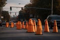 a row of traffic cones guiding drivers to a detour during roadwork